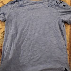A purple t-shirt for girls size XL